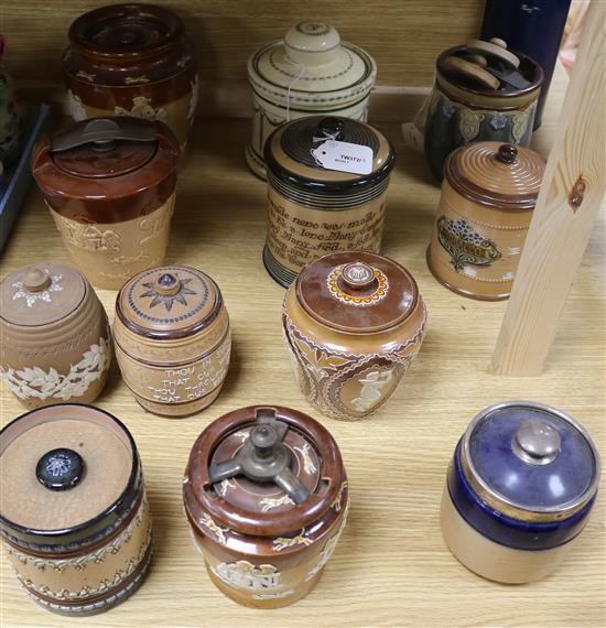 Twelve Doulton tobacco jars and covers, various designs